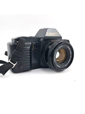 Canon T70 35mm SLR Film Camera + 50mm 1:1.8 Prime Lens - Case-Uses AA Batteries